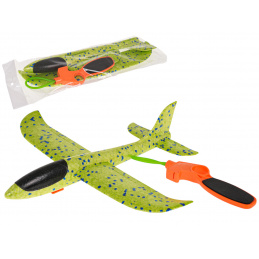 Polistirenski avion s ručnim katapultom zelene boje
